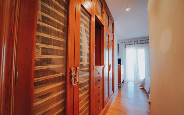 Villa con piscina a pie de playa