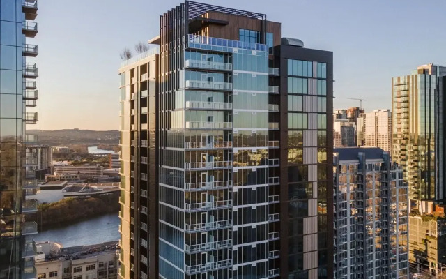 20th floor condo with pool on Rainey St by Locale