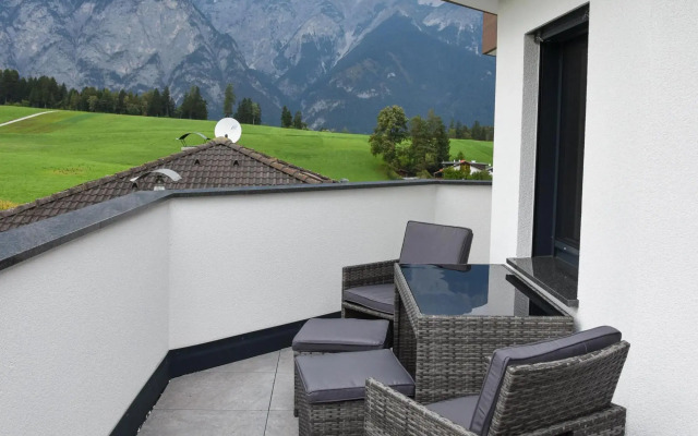 Apartment in Götzens with roof terrace and e-car charging station