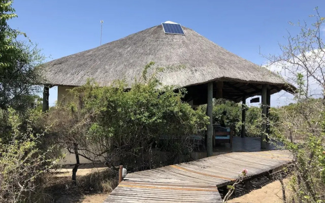 Saadani Safari Lodge - bush, river, beach