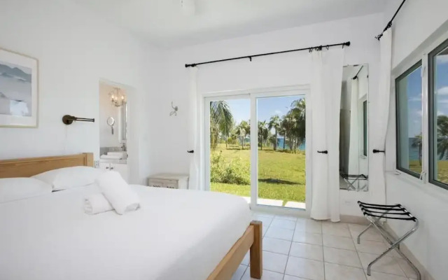 Dream Villa: Private Oasis Above Pink Sand Beach