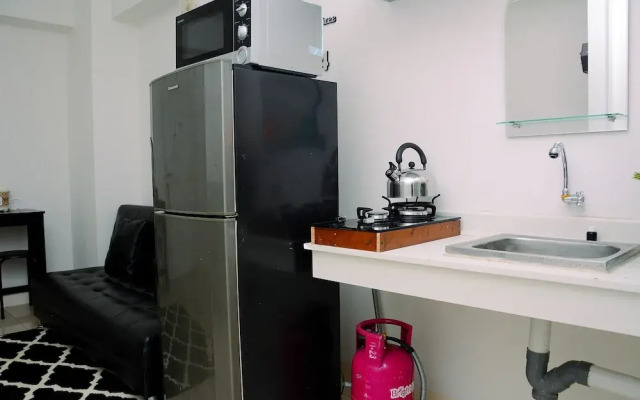 Homey 2BR at Bassura City Apartment