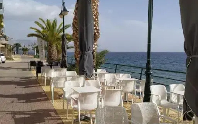 Doll house next to the sea