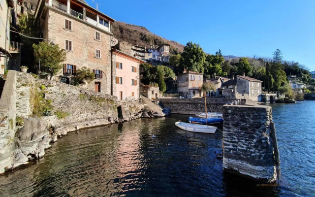 Snug apartment in Dervio with balcony or terrace