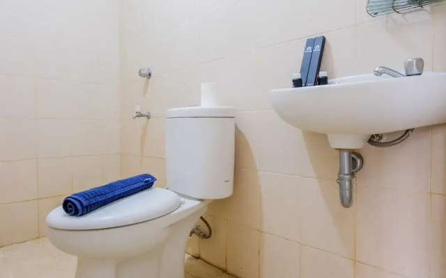 Homey 2BR at Serpong Greenview Apartment