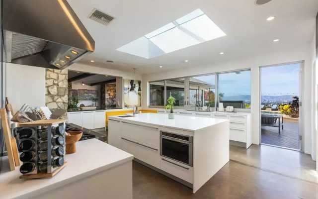 Stylish Hillside Retreat with Pool & Views