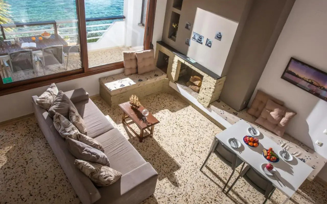 Exclusive Seaside Retreat with Shared Pool & Private Beach Access