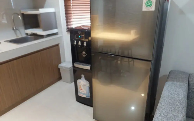 Spacious and Homey 2BR at Springwood Residence Tangerang Apartment