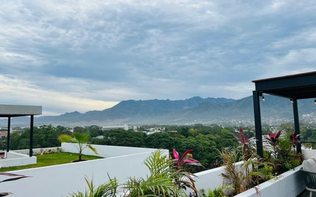 Serene Stylish Stay Roof Pool and Lounge