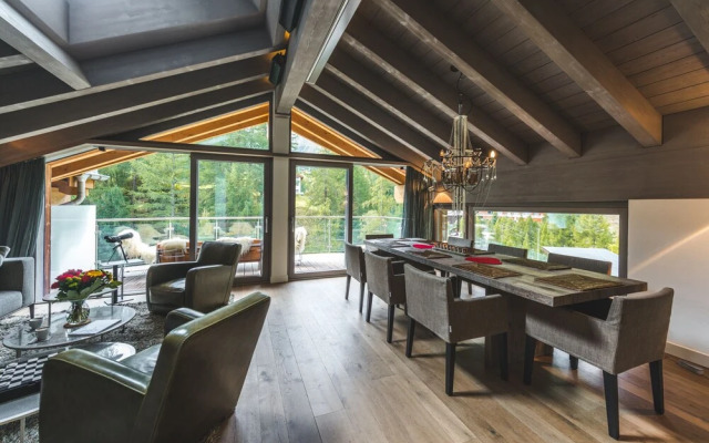Mountain Exposure Luxury Chalets & Penthouses & Apartments