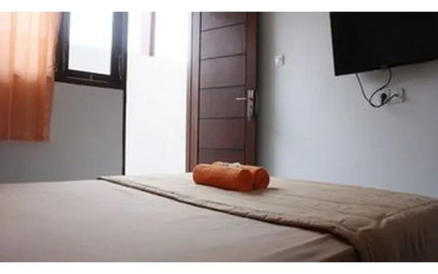 Nida Rooms Gelogor Carik Denpasar at Guest House Orchid