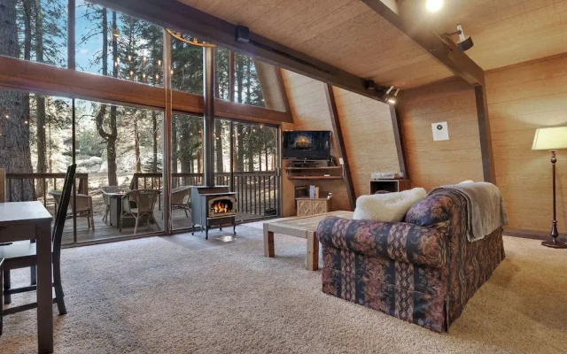 A Frame Hideaway | Floor to Ceiling Windows in the Pines