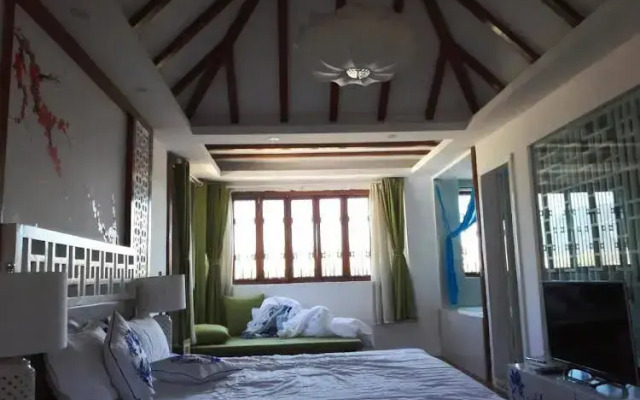 Lijiang XI Ri Qing Huai Sunlight Inn