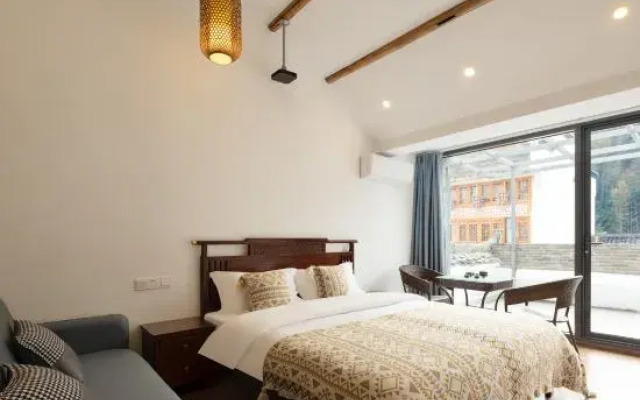 Qianxun Wuyuan Likeng Taoyuanju Boutique Guesthouse
