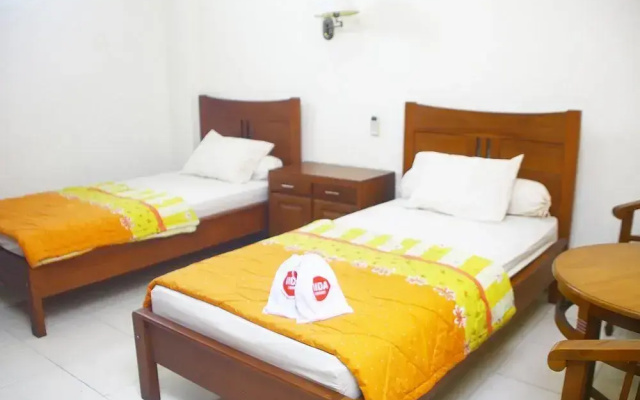 NIDA Rooms Ring Road Utara 1E
