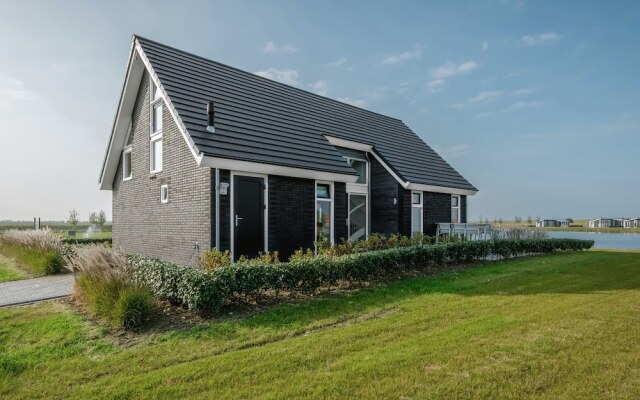 Stylish Holiday Home with Fireplace near Oosterschelde