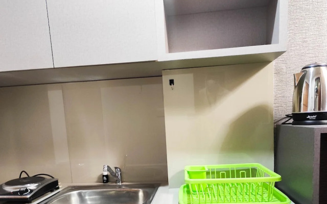 Nice And Elegant Studio At Vida View Makassar Apartment