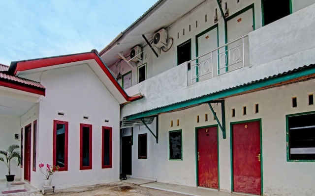 SPOT ON 91950 Guest House TekNong Syariah — 2-star hotel in Bangkinang