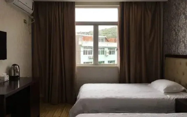 Cangnan Moon Bay Supermarket Hotel