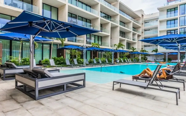 Contemporary Design Oceana 422 Playa del Carmen Condo by RedAwning