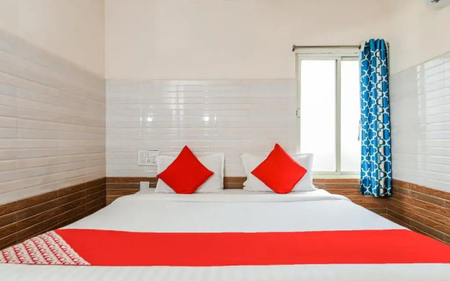 Varsha Grand Residence by OYO Rooms