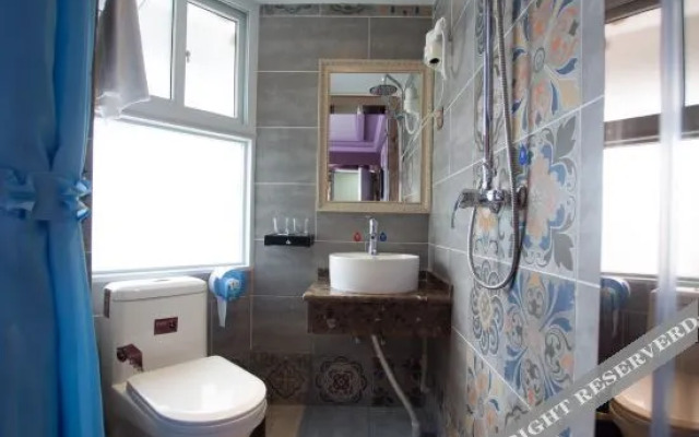 Qiziyuan Theme Apartment Hotel