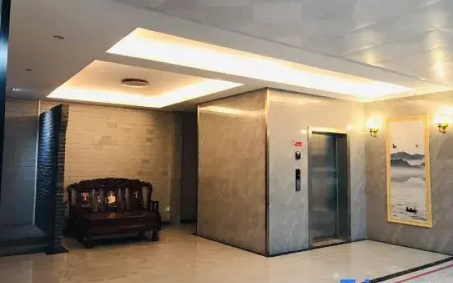 Pingle Xingfu Hotel