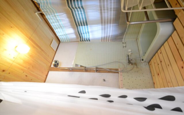 Taketa station hostel cue