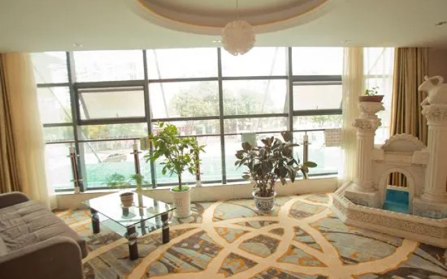 Xingshan Luoma Holiday Hotel