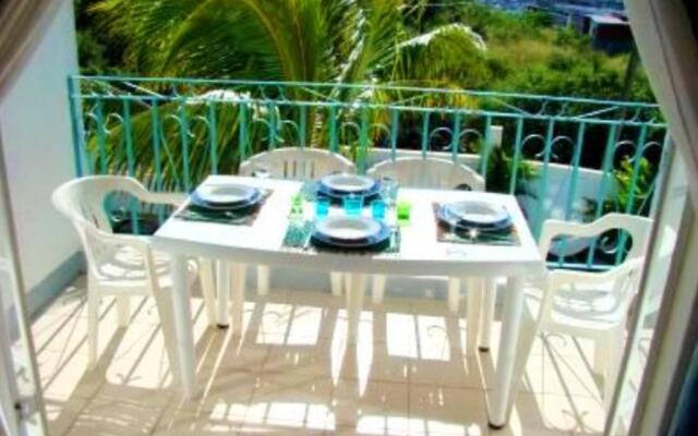 3 bedrooms appartement at Grand Baie 300 m away from the beach with shared pool enclosed garden and wifi