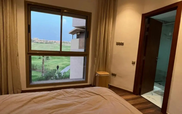 Superbe appartement, vue sur golf, piscine et Atlas