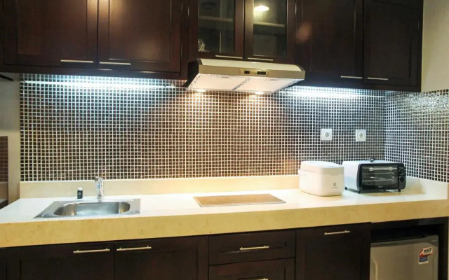 Elegant 1BR Kemang Village Apartment By Travelio