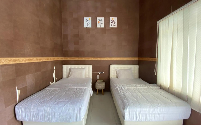 Capital O 1888 Griya RW Family Guest House