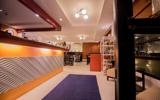 The Red Palm Suites and Restaurant