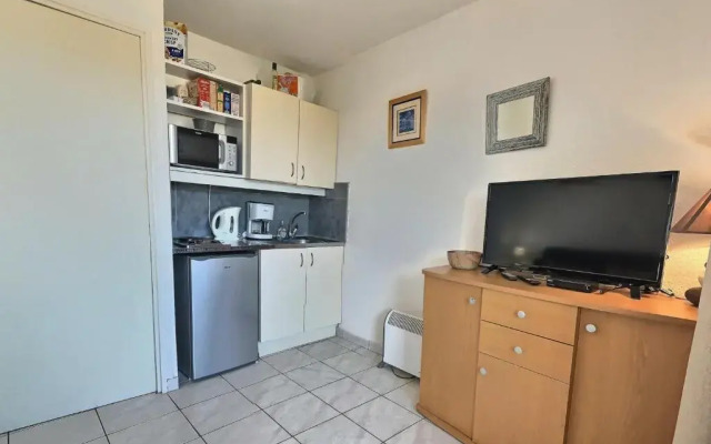 Studio cabine pour 4 personnes avec piscine commune