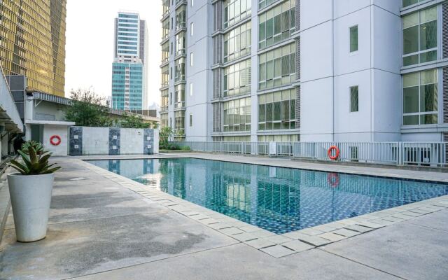 Comfortable Deluxe 2BR at The Empyreal Condominium Epicentrum Apartment By Travelio