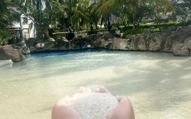 Grand Tropic Suites Hotel