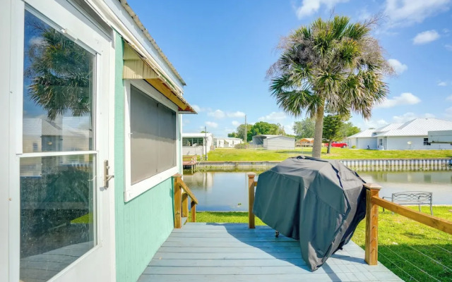 Boat & Fish: Canal-front Home on River