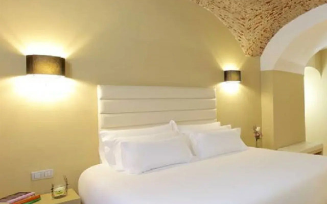 Отель NH Collection Cáceres Palacio de Oquendo