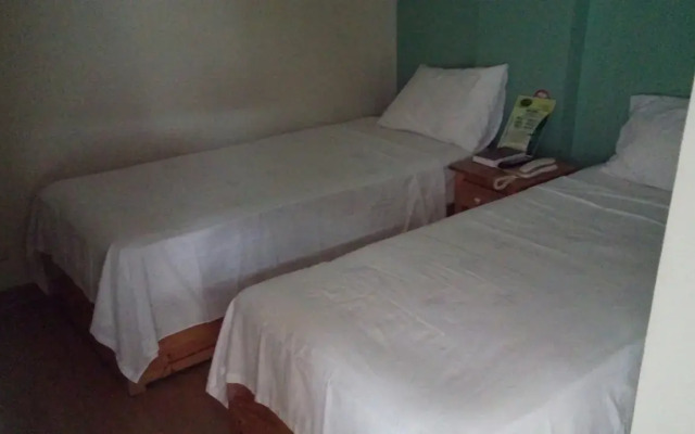 GraceHill EconoSuites Hotel