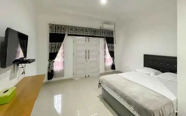 Hotel Lucky 21 Syariah Mitra RedDoorz