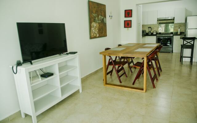 Sunny apartment at the beach with pool