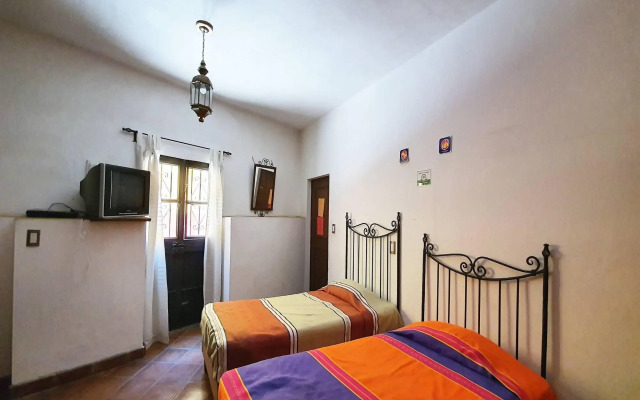 Capital O Hotel Al Son de los Santos - Hostel