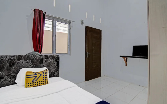 SPOT ON 91699 Homestay Hj Lela Syariah