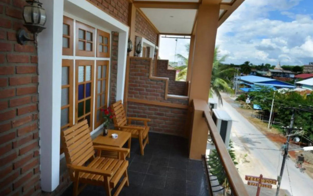 Teak Wood Hotel
