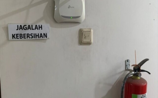 SPOT ON 93460 Lewi Family Guest House Near GBKP Bangun Mulia Km. 11