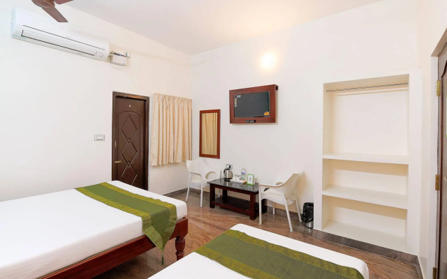 Treebo Grace Inn, 3 Min Walk From Promenade Beach