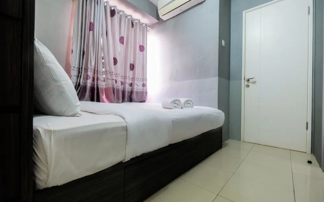 Monochrome Style 2 Bedrooms at Kalibata City Apartment By Travelio