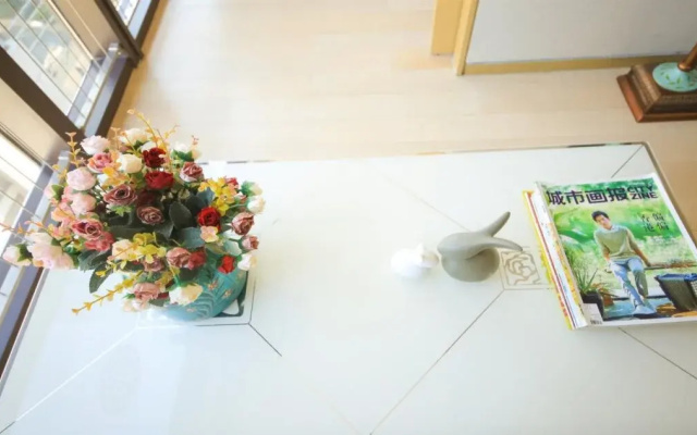Qingdao Lejiaxuan Yuexi Apartment Hongkong Central Rd The MIXC Branch