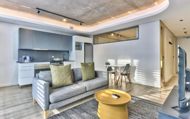 One Bedroom With Balcony and City Views